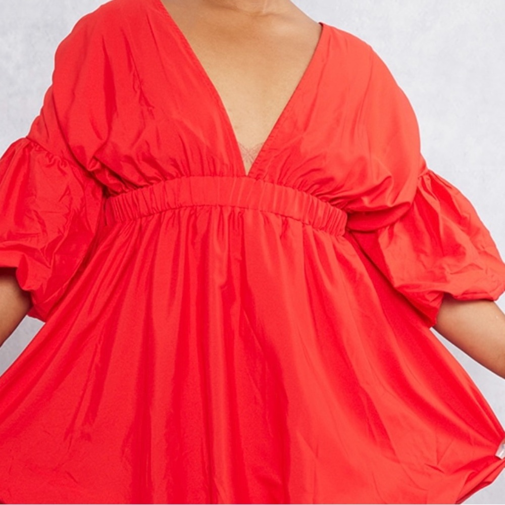 Gorgeous Rust Puffsleeve dress with Puff Hem